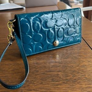 Teal COACH leather wallet with strap